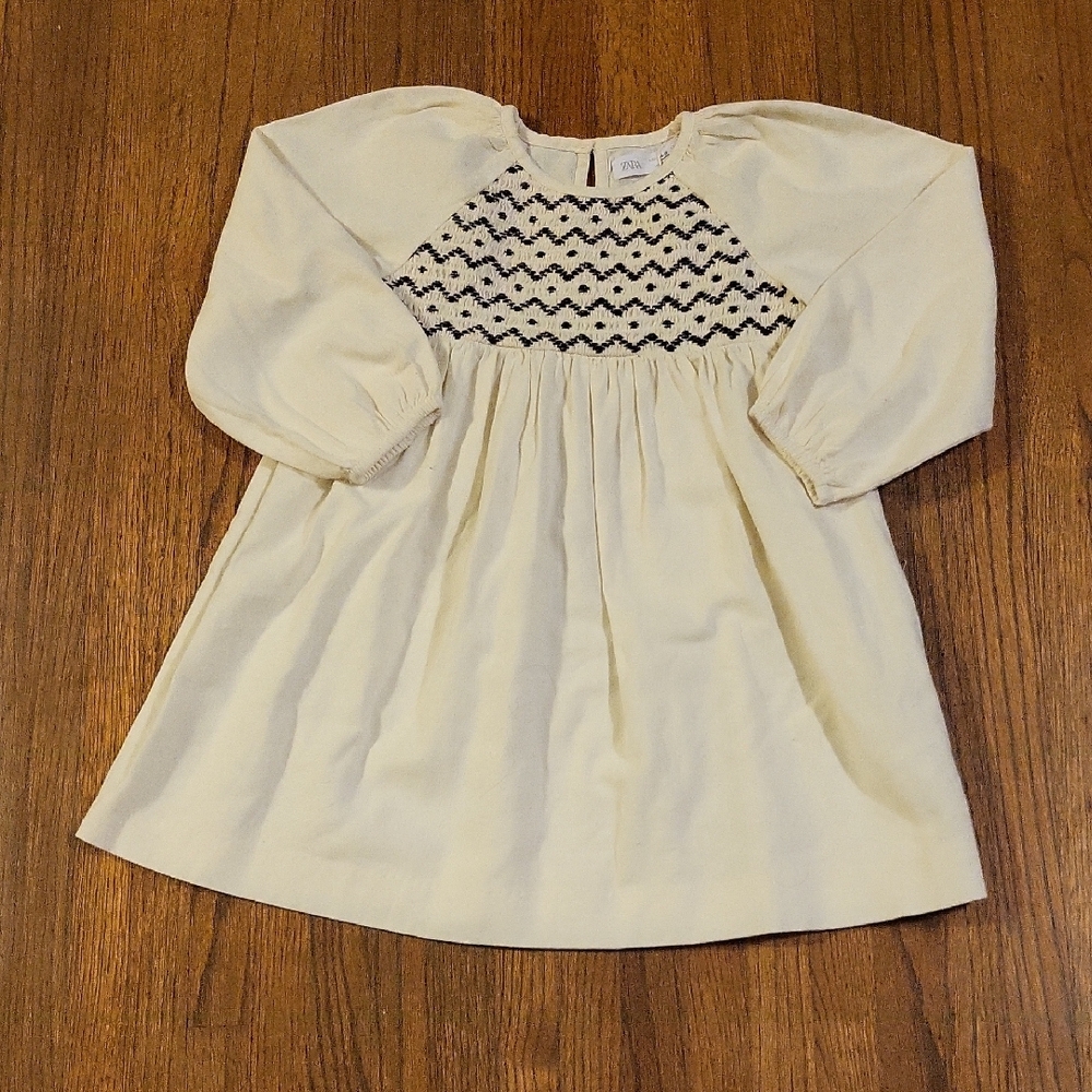 Zara Elegant Cream Dress with Black Pattern